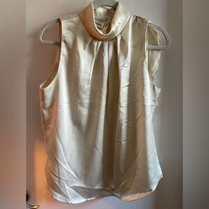 Vintage Chic Sleeveless Cream Blouse